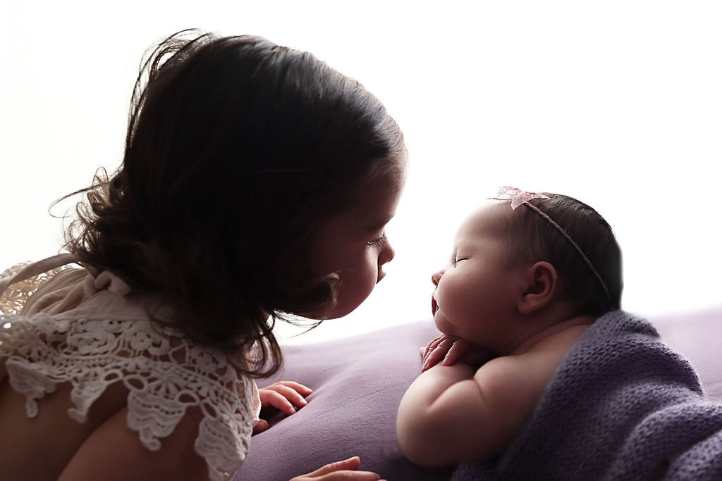 newborn sibling photos