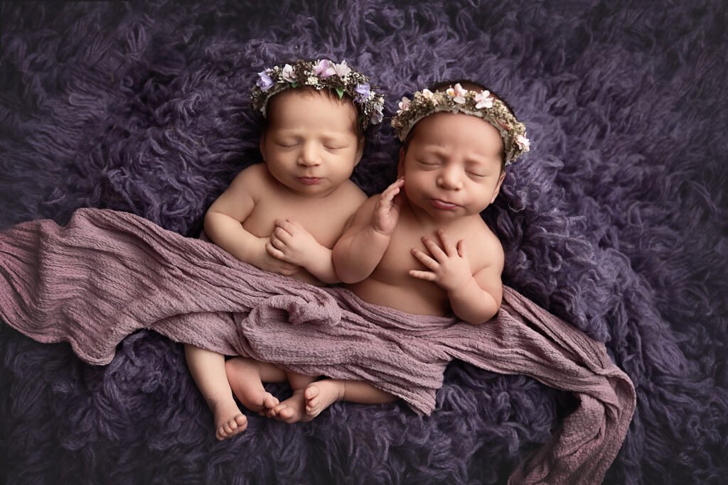 Professional newborn pictures of twin girls