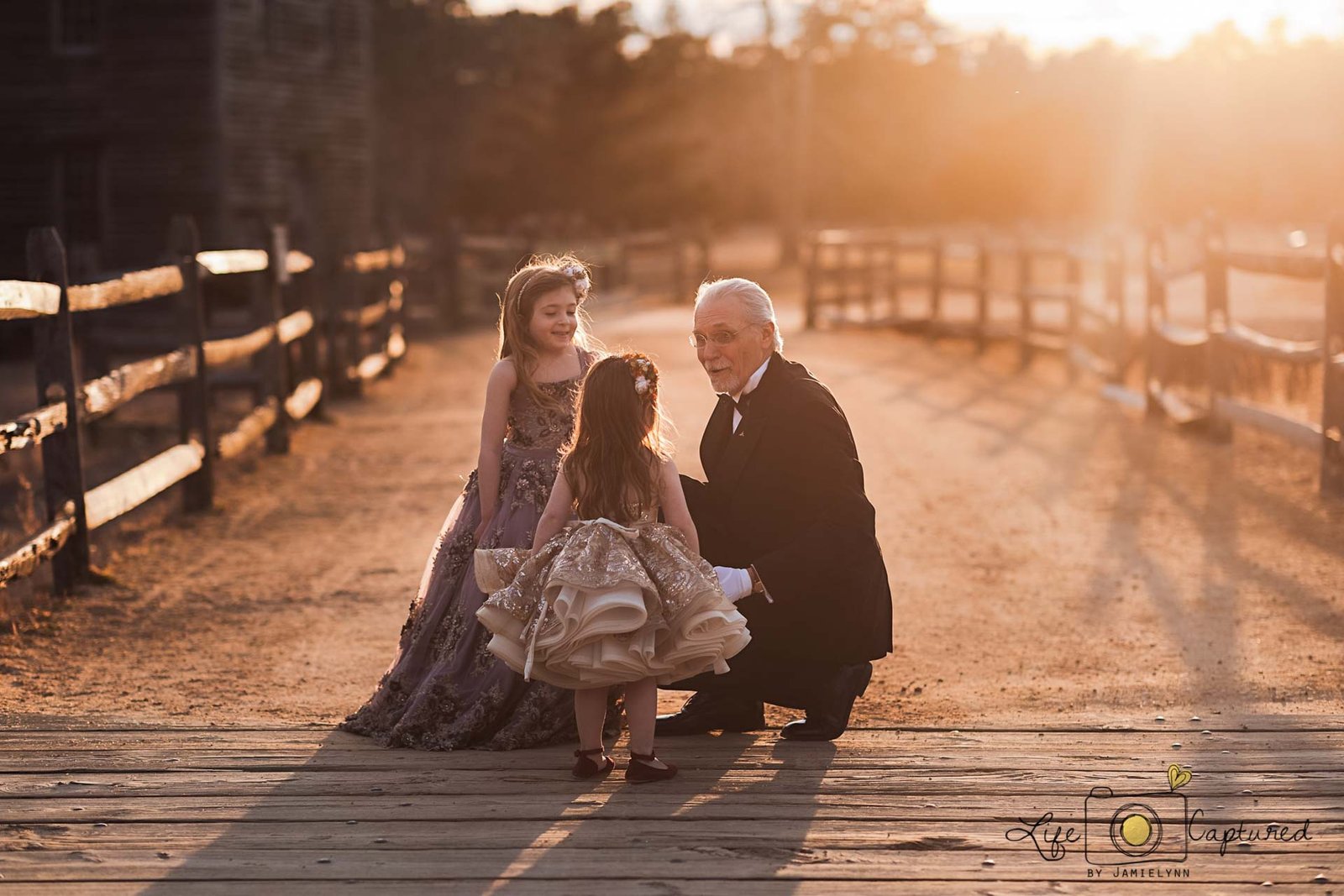 Golden hour portrait of my father and his granddaughters